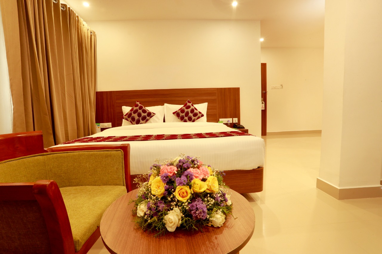 Floral bouquet centerpiece on coffee table in hotel room